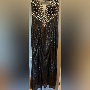 Very nice quality sequined and crystal stone lace-up back formal.